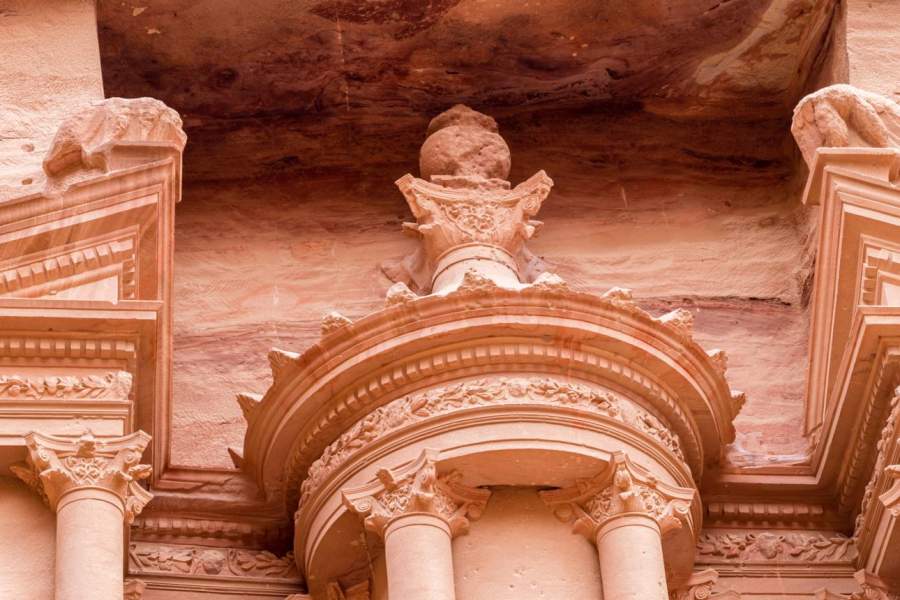 Close-up of the top of urn of Al-Khazneh in Petra Jordon. Petra is UNESCO World Heritage Site and is one of New7Wonders of the World.
